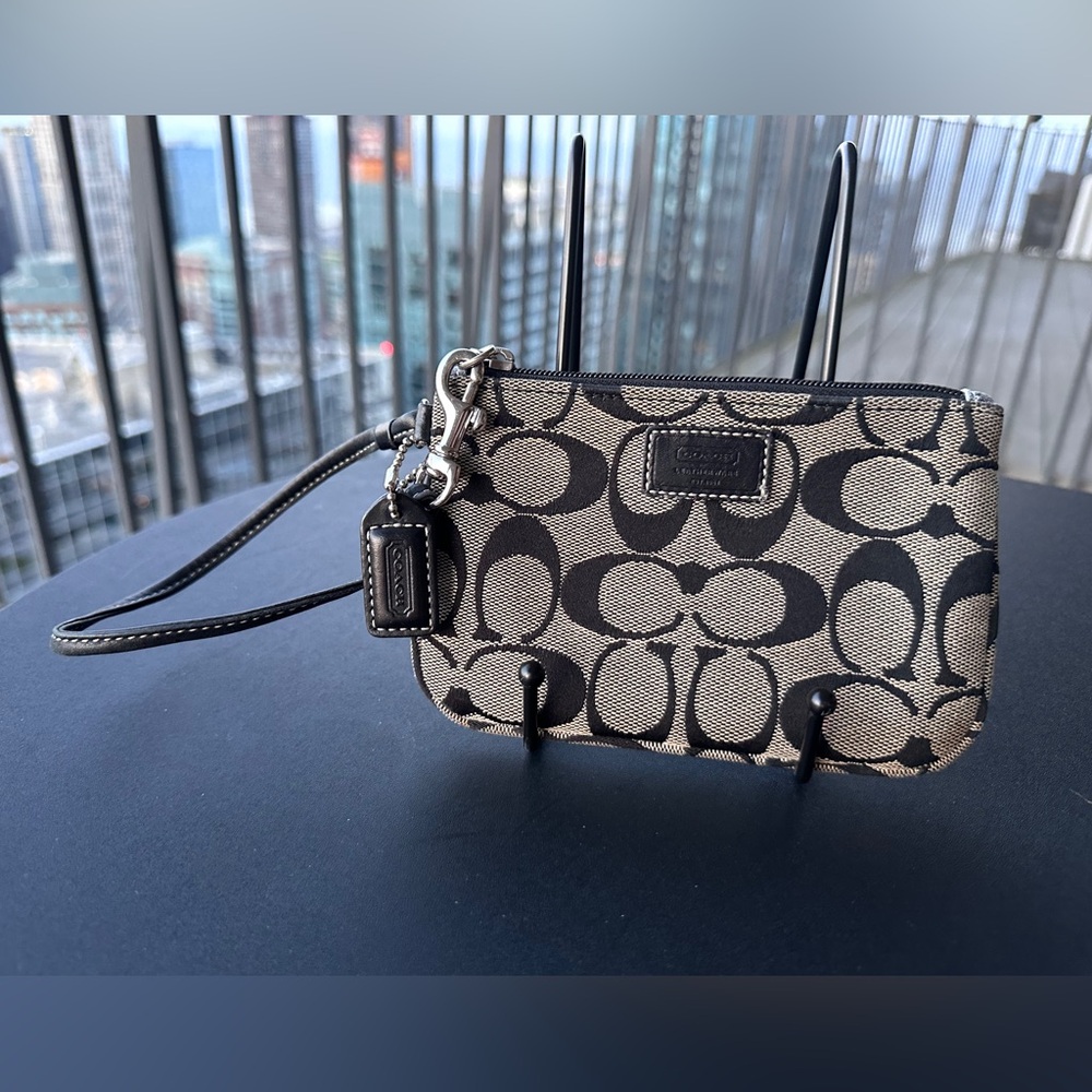 Coach wristlet black & gray with C logo pattern good used condition